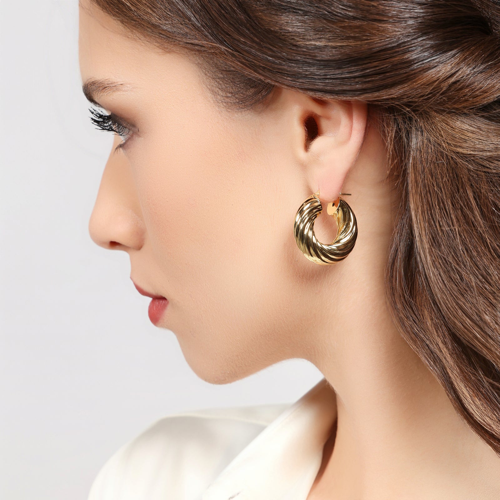 UNOAERRE | Orecchini cerchio torchon dorati | 2809