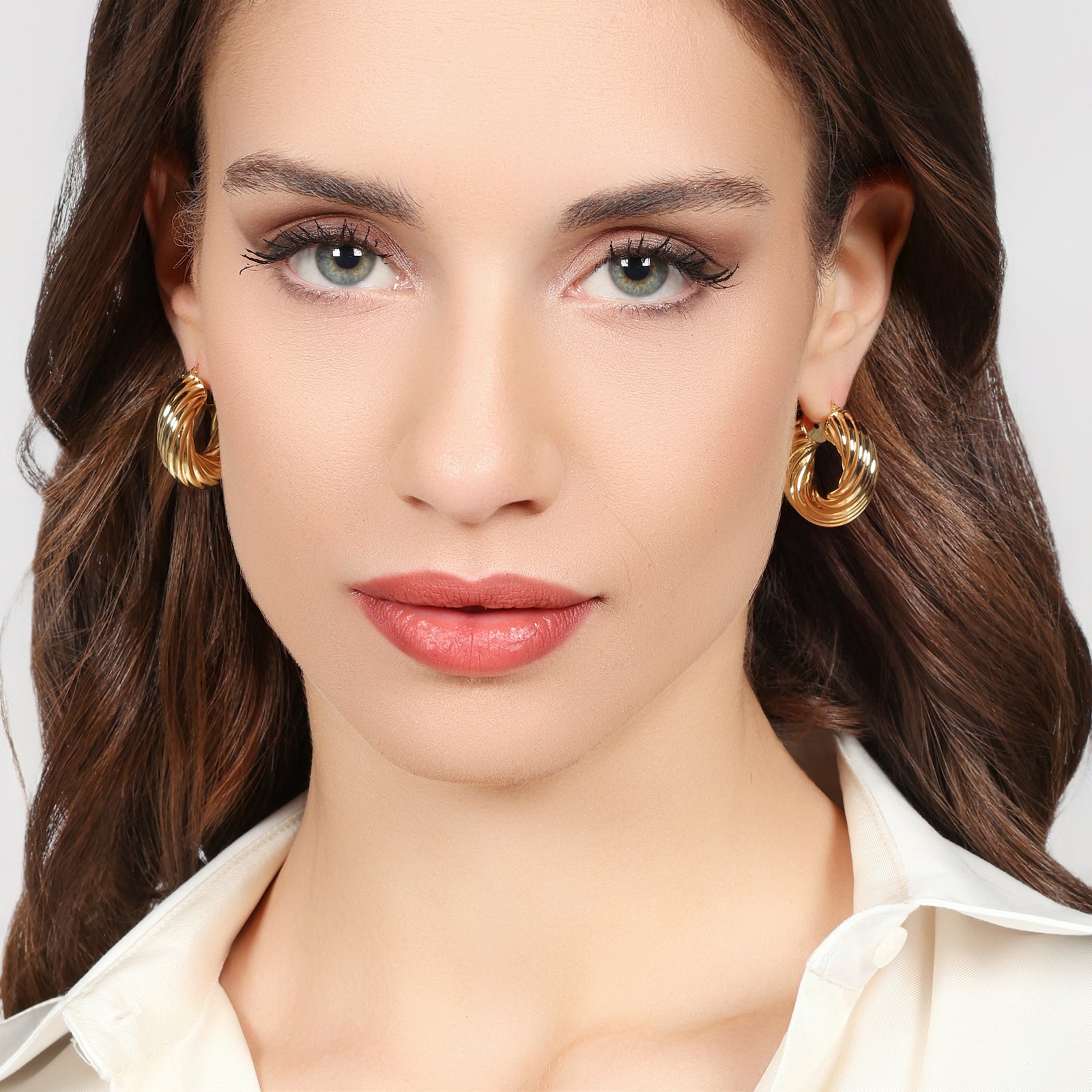 UNOAERRE | Orecchini cerchio torchon dorati | 2809