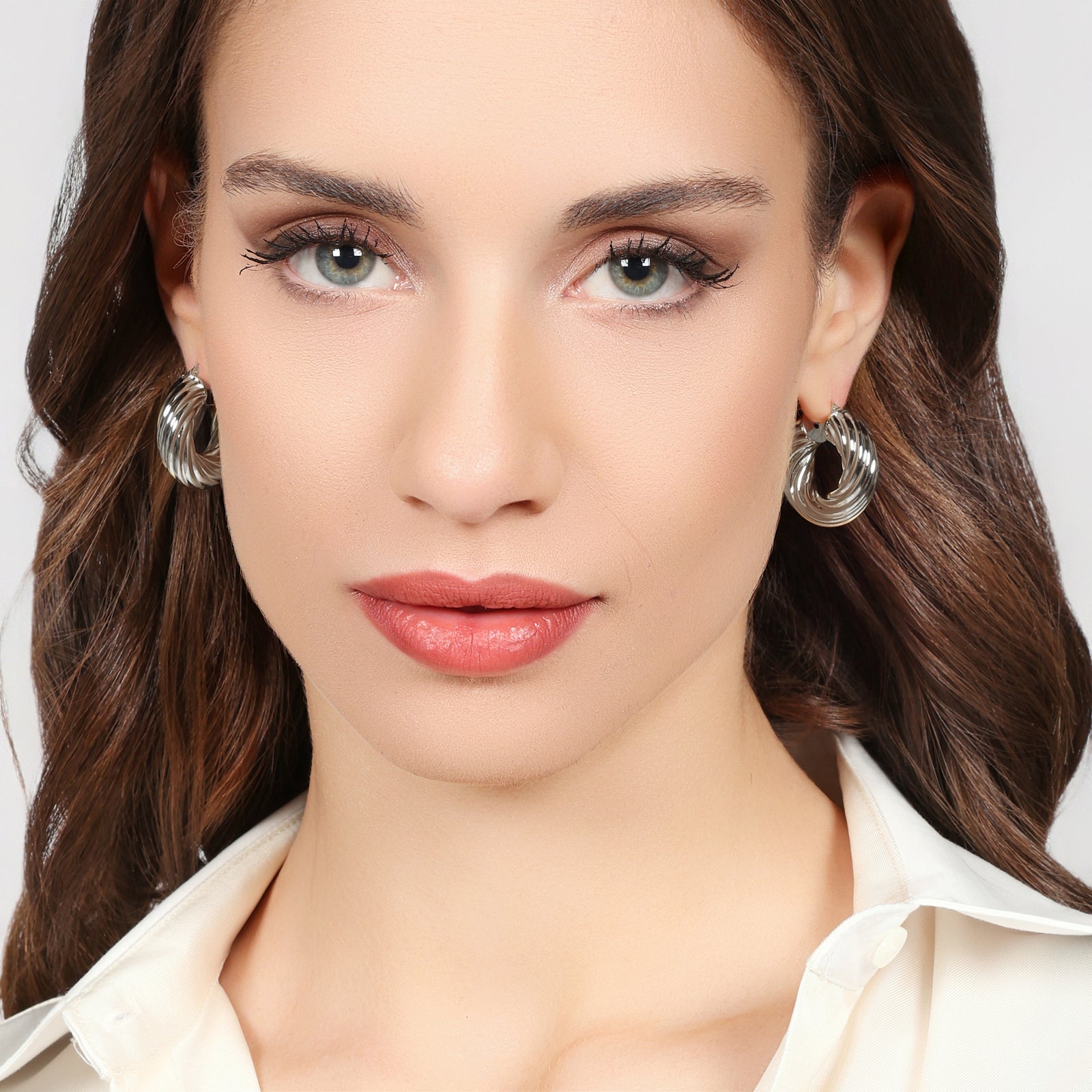 UNOAERRE | Orecchini cerchio torchon argentati | 2810