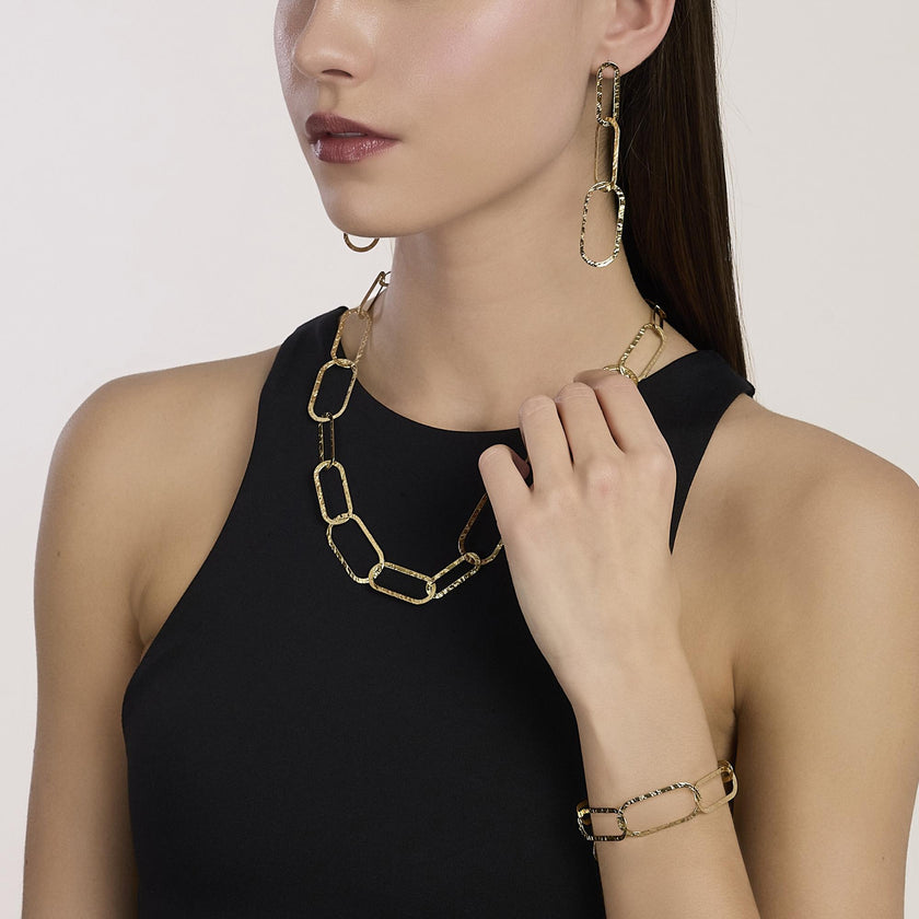 Kidult Style 83 | Orecchini pendenti in acciaio dorato martellato | 861138