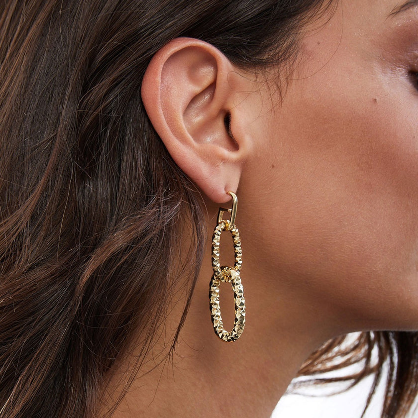 UNOAERRE | Orecchini in bronzo dorato | 1897