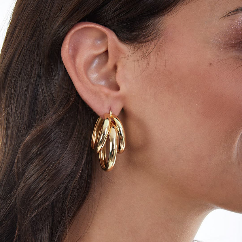 UNOAERRE | Orecchini in bronzo dorato | 1963