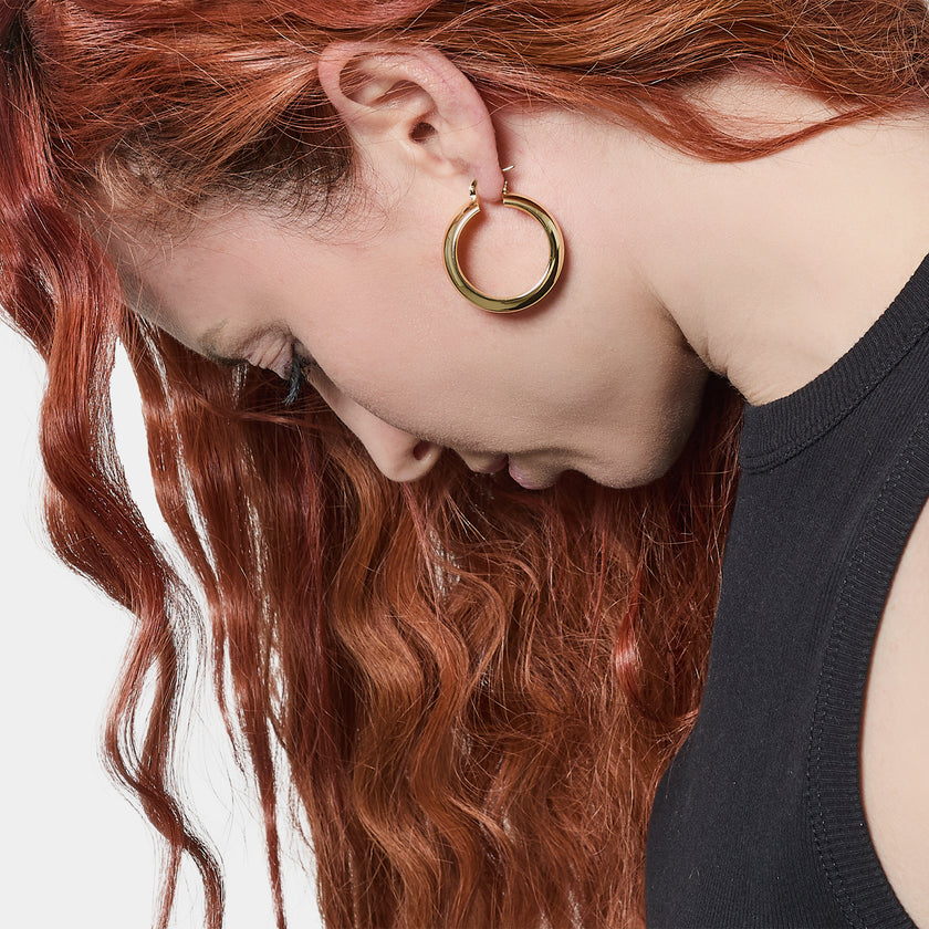 UNOAERRE | Orecchini a cerchio dorati | 2689